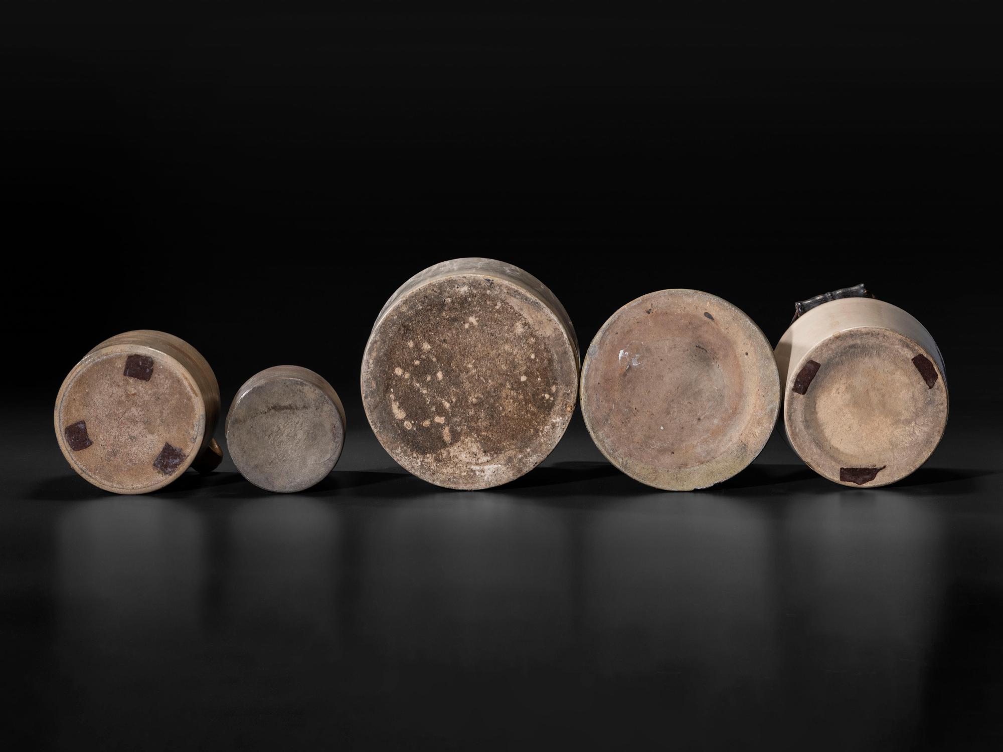Sixteen Stoneware Vessels