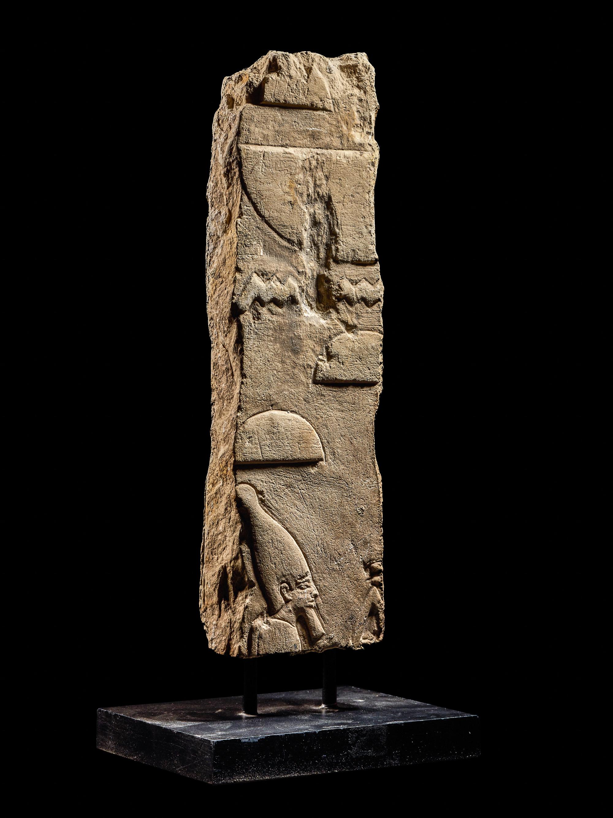 An Egyptian Limestone Relief Fragment with a Pharaoh