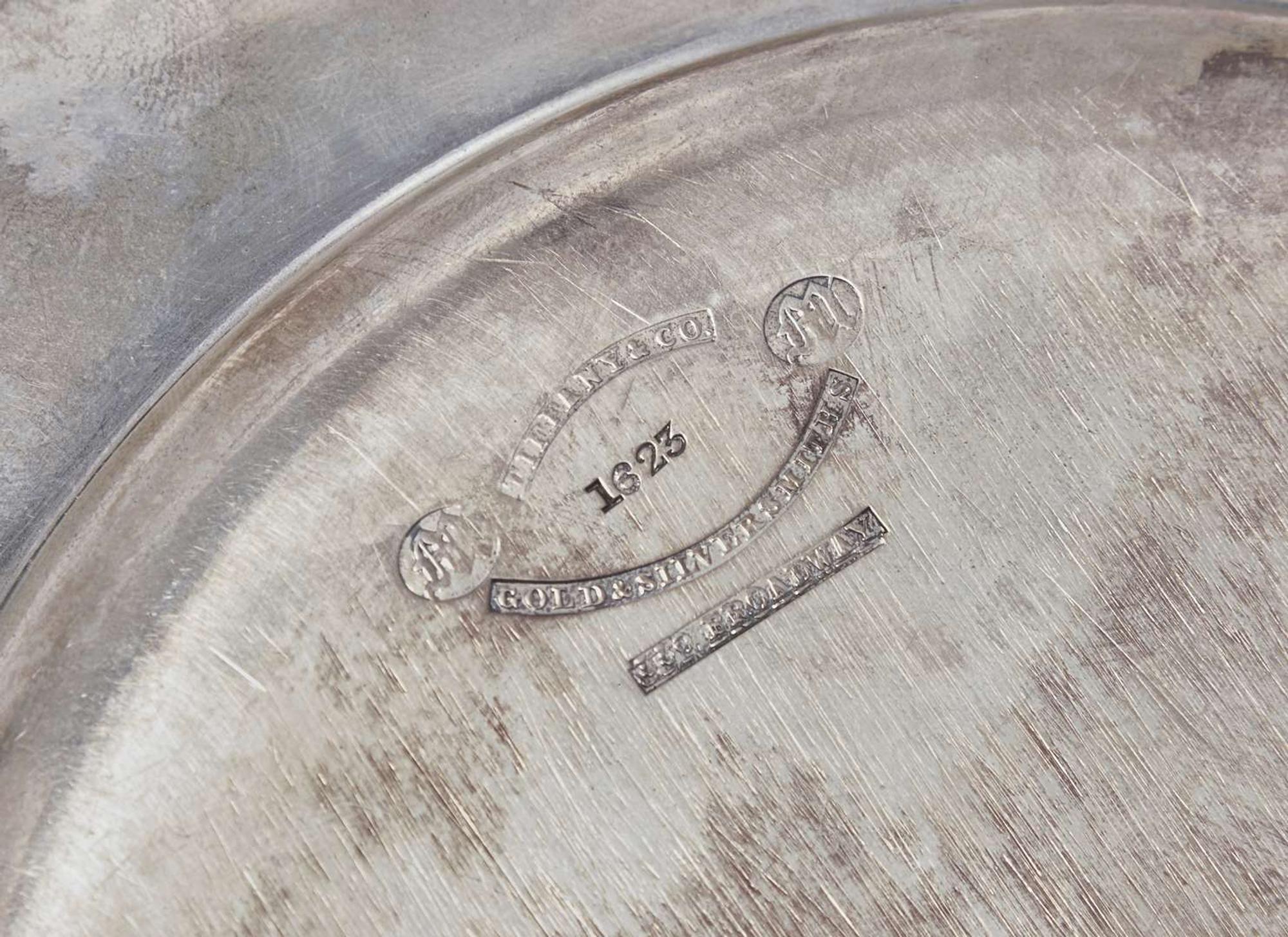 An assembled group of seven sterling silver tablewares, Tiffany & Co., New York, NY, dates ranging 1854-1891