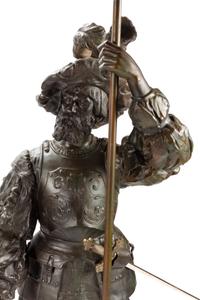 A Pair of Cast Metal Figural Torchères