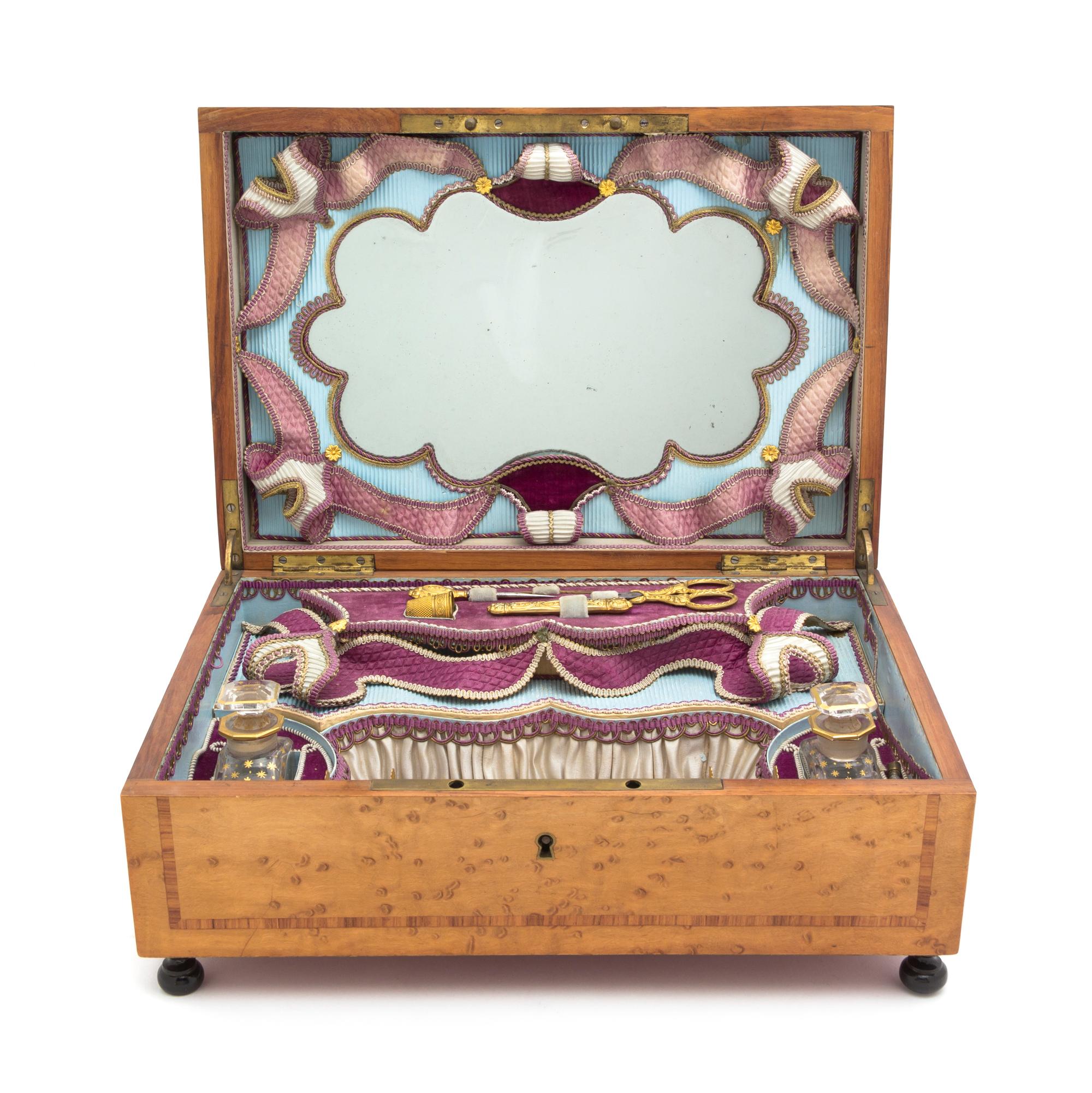 A Continental Mother-of-Pearl and Brass Inlaid Various Woods Musical Dresser Box, Width 13 1/2 inches.