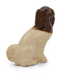 A Brown-Glazed Stoneware Dog Figure