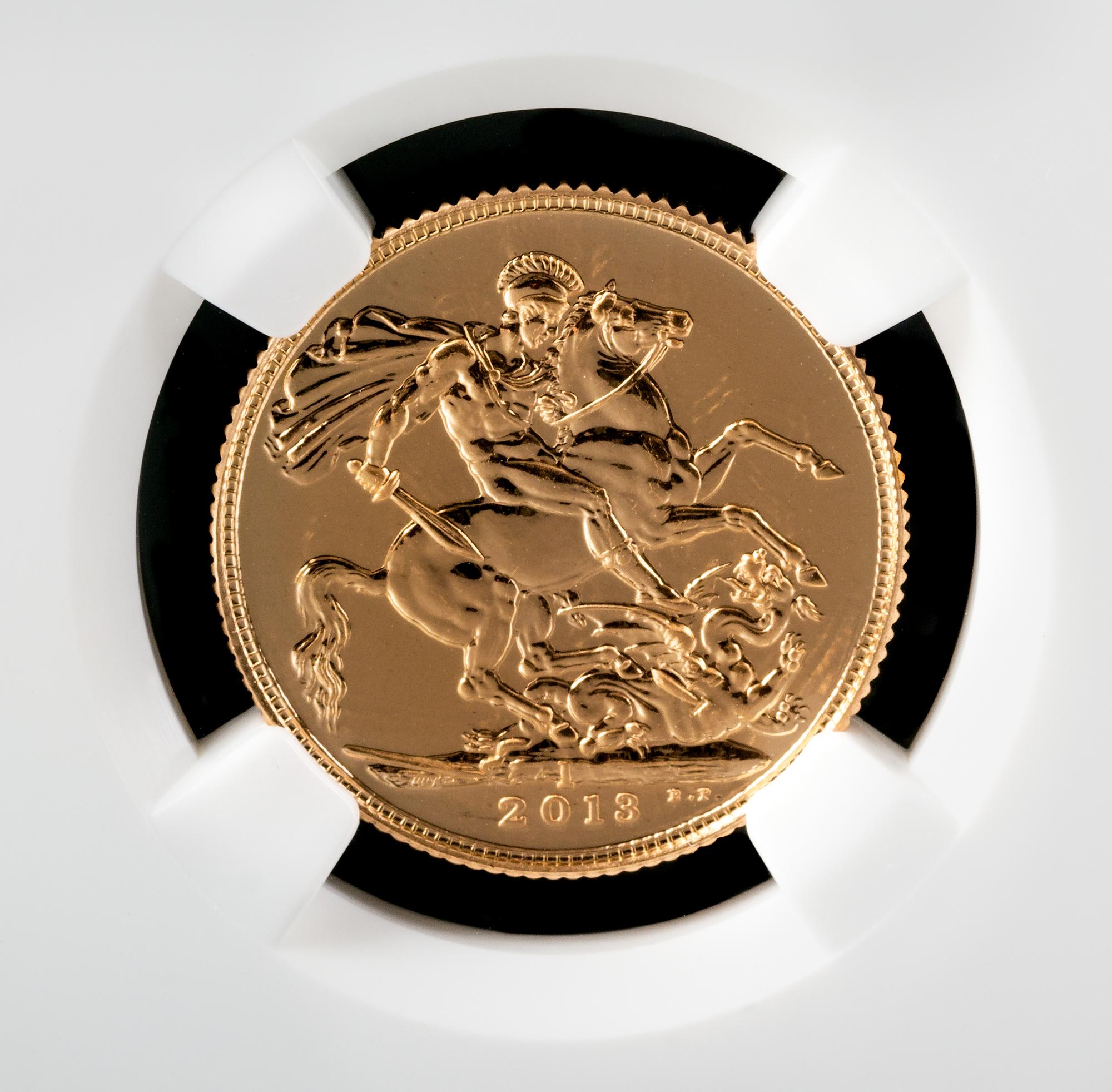 A Group of Four United Kingdom Royal Mint 2013-India Gold Sovreign Coins