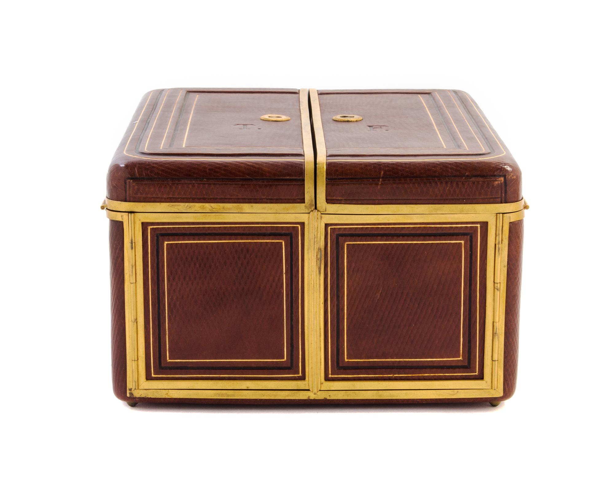 A French Brass Mounted Leather Jewelry Casket Height 5 5/6 x width 9 x depth 11 1/4 inches. — PAUL SORMANI, PARIS, LATE 19TH CENTURY