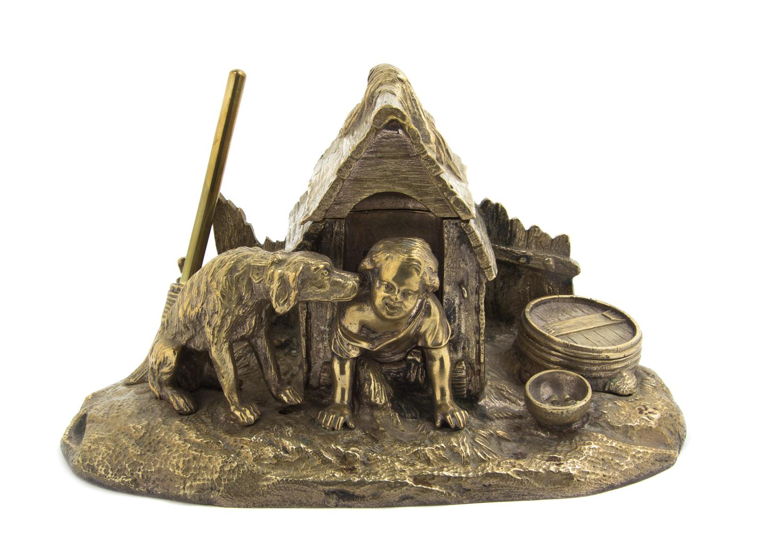 A Continental Gilt Metal Figural Encrier, Width 8 1/4 inches.