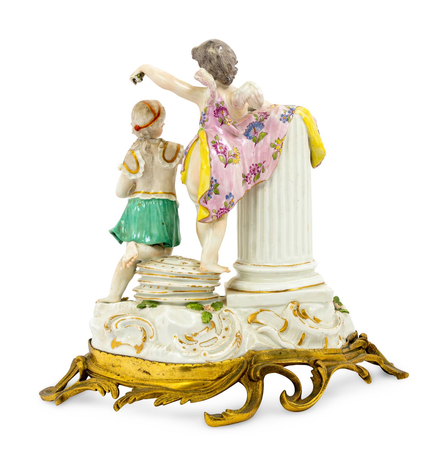 A Meissen Porcelain Figural Mantel Clock