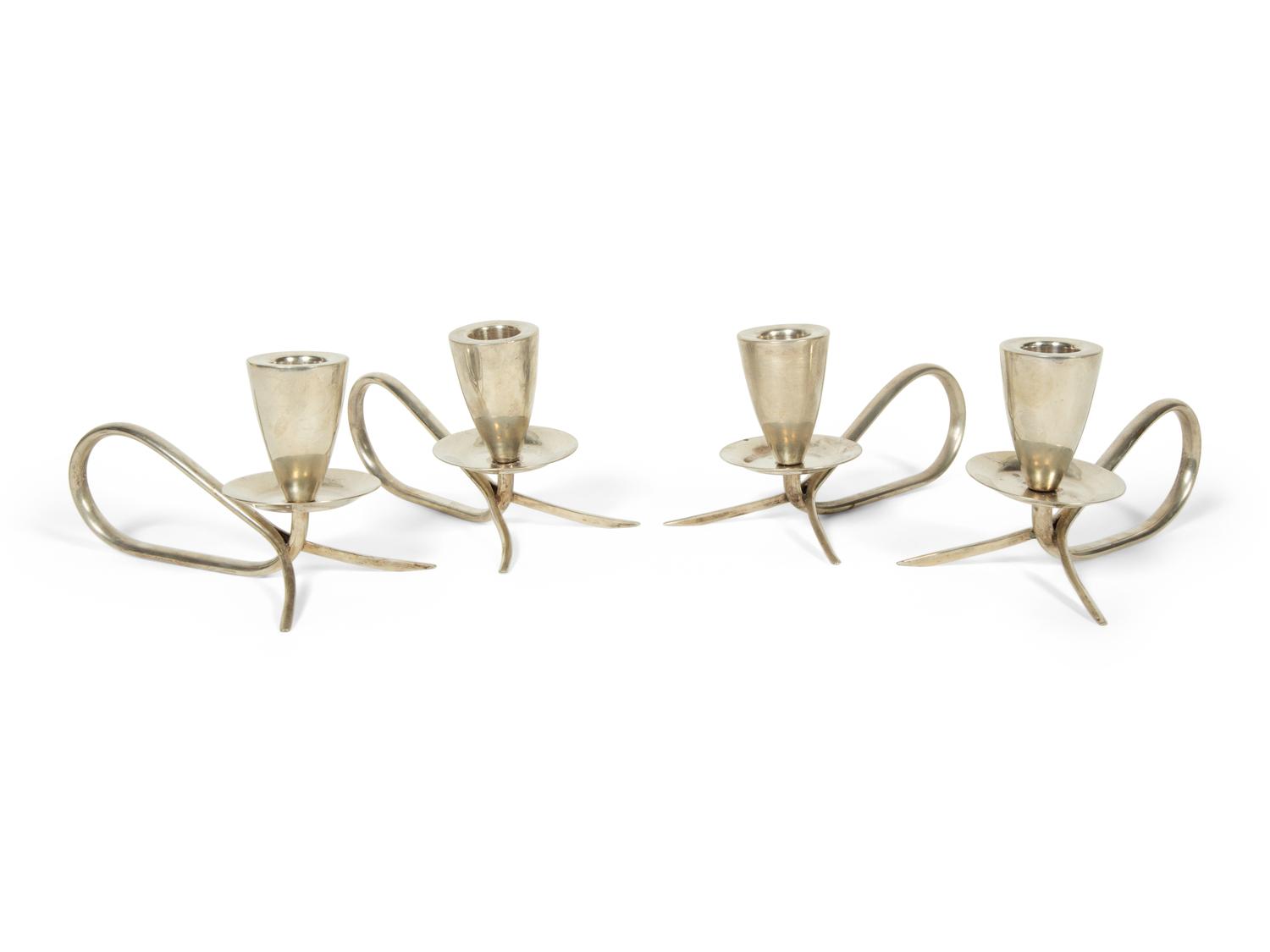 A Set of Four Mexican Silver Candle Holders — 20TH CENTURY