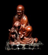A Chinese Longyan / Lychee Wood Figure of a Luohan