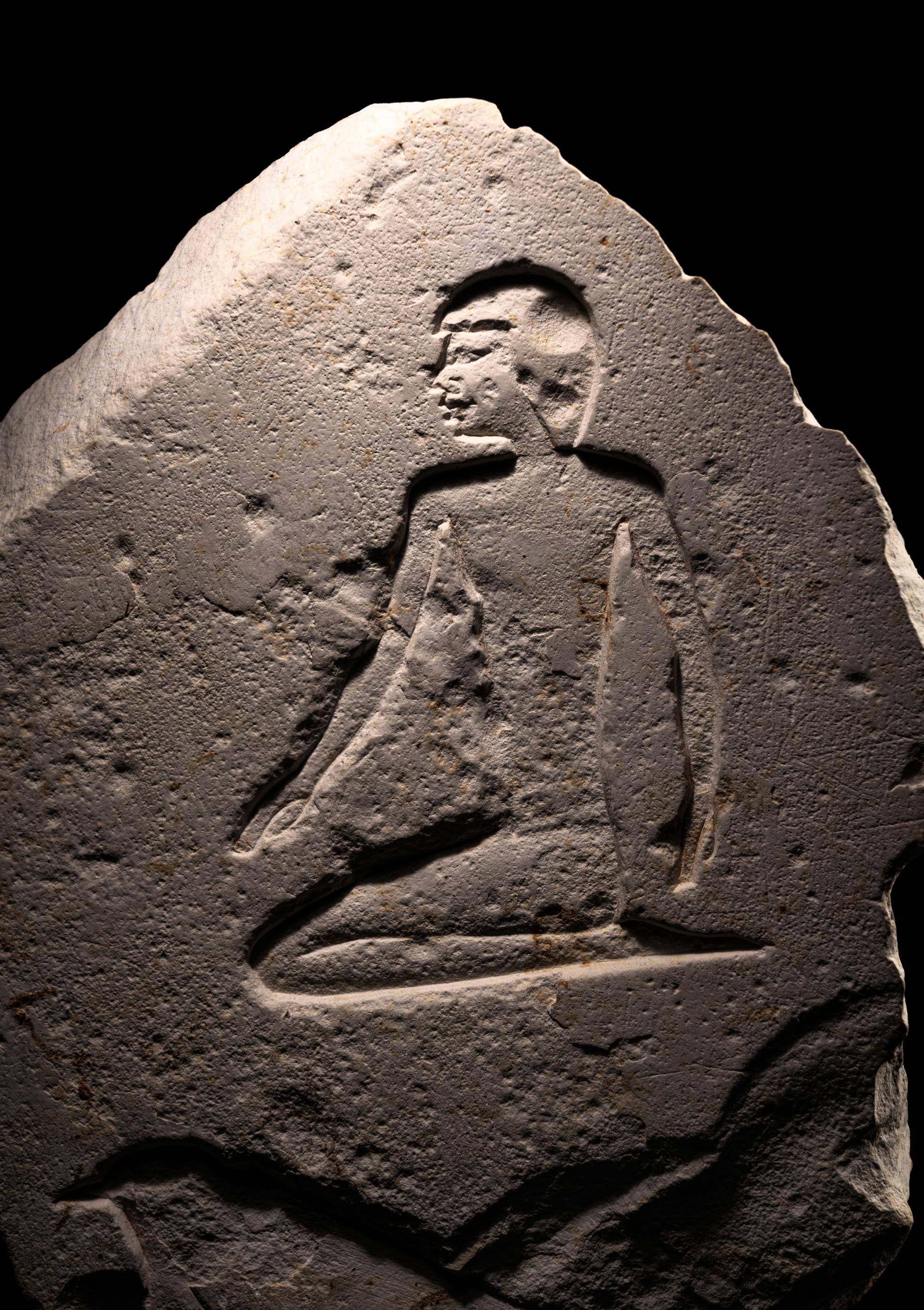 An Egyptian Limestone Fragmentary Inscription
