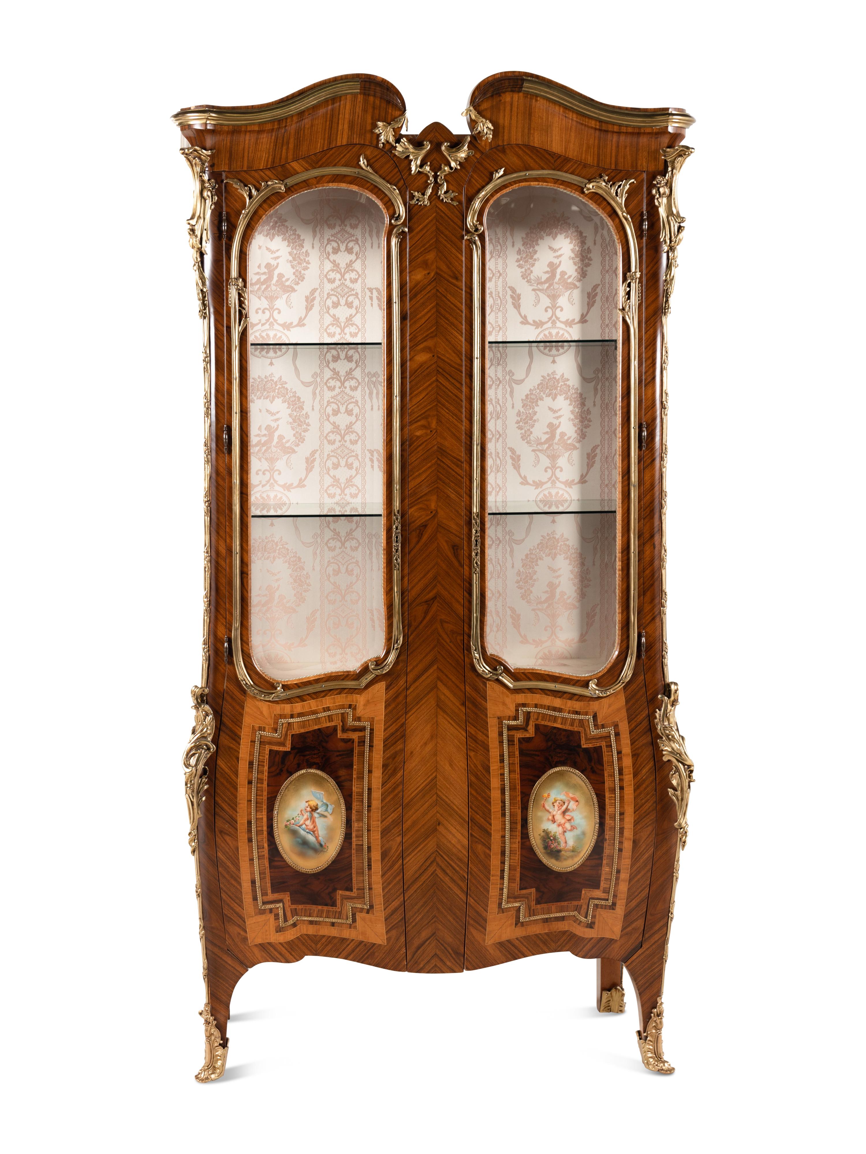 A Pair of Louis XV Style Gilt Bronze Mounted Tulipwood Vitrine Cabinets