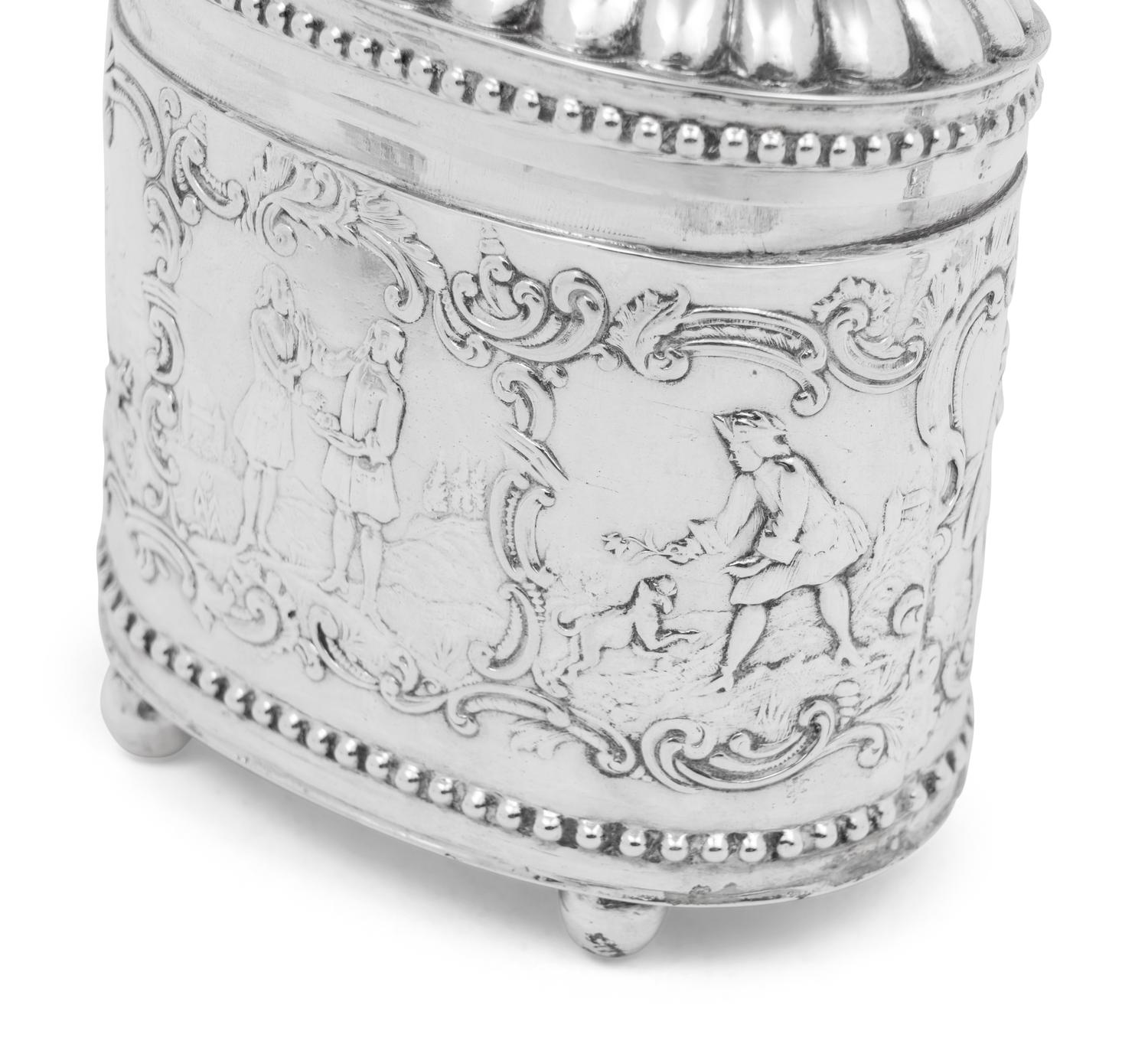 A Continental Silver Tea Caddy, Strainer and Tea Ball