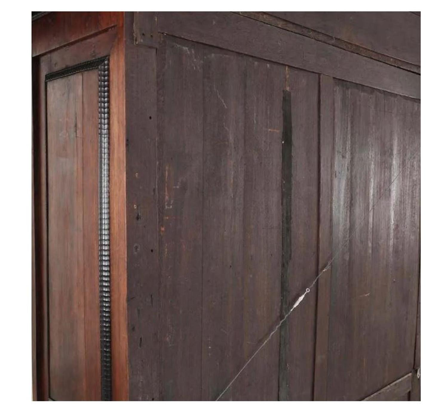 A Flemish Part-Ebonized Carved Rosewood Armoire — 17TH/18TH CENTURY