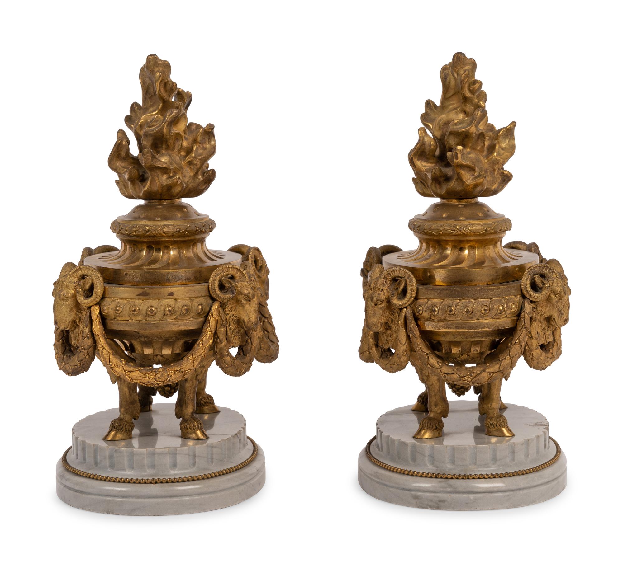 A Pair of French Neoclassical Gilt Bronze and Marble 'Flaming Urn' Ornaments