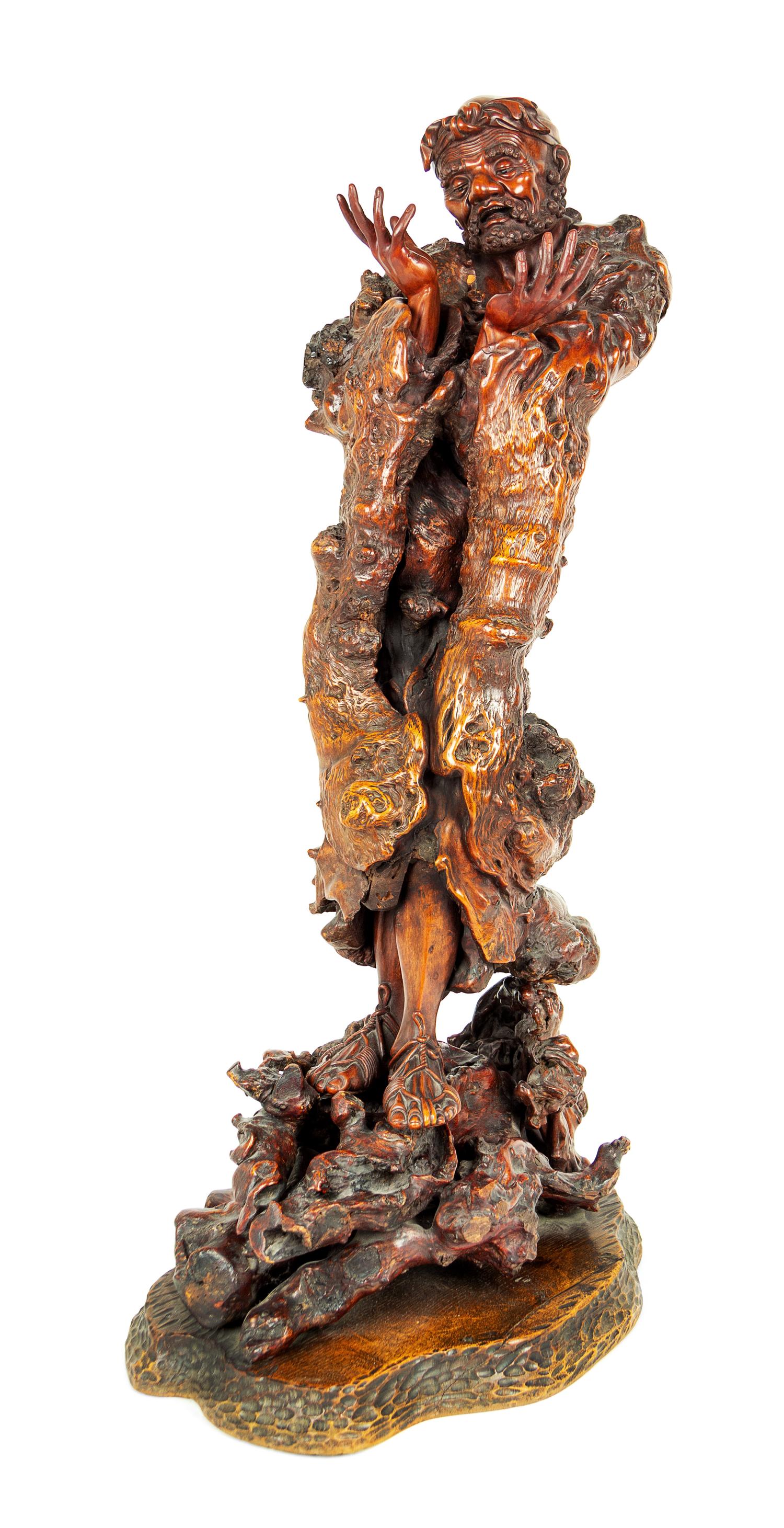 A Carved Burlwood Figure of an Immortal Height 39 inches. — 18TH CENTURY