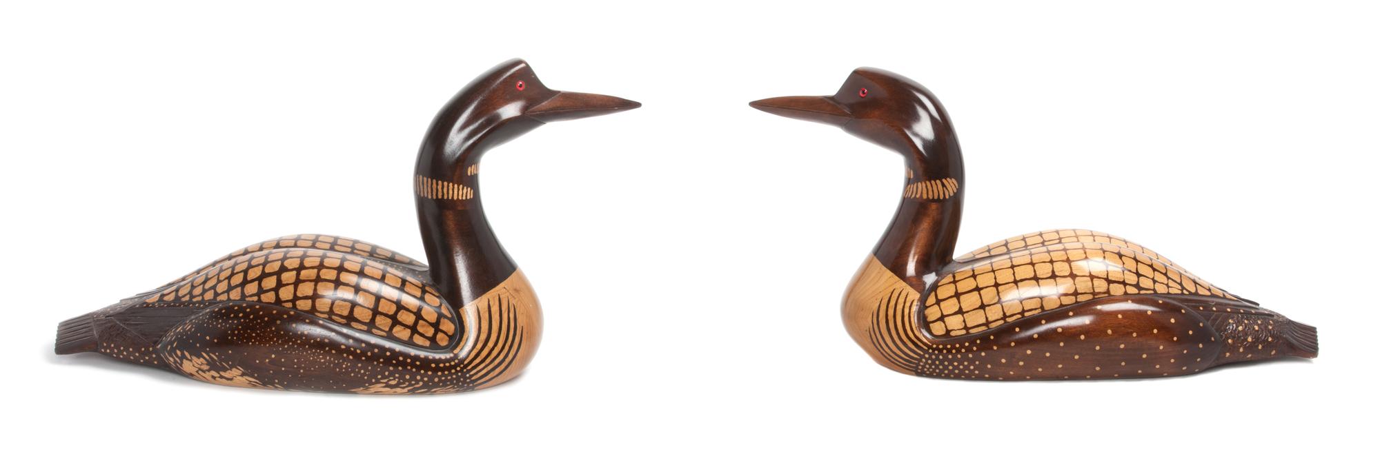 A Pair of American Carved and Painted Wood Loons Height of each 13 1/2 inches.