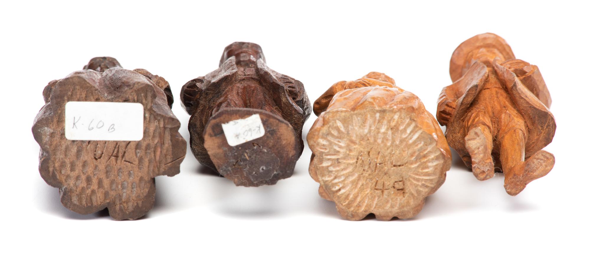 Four Carved Wooden Folk Art Figurines