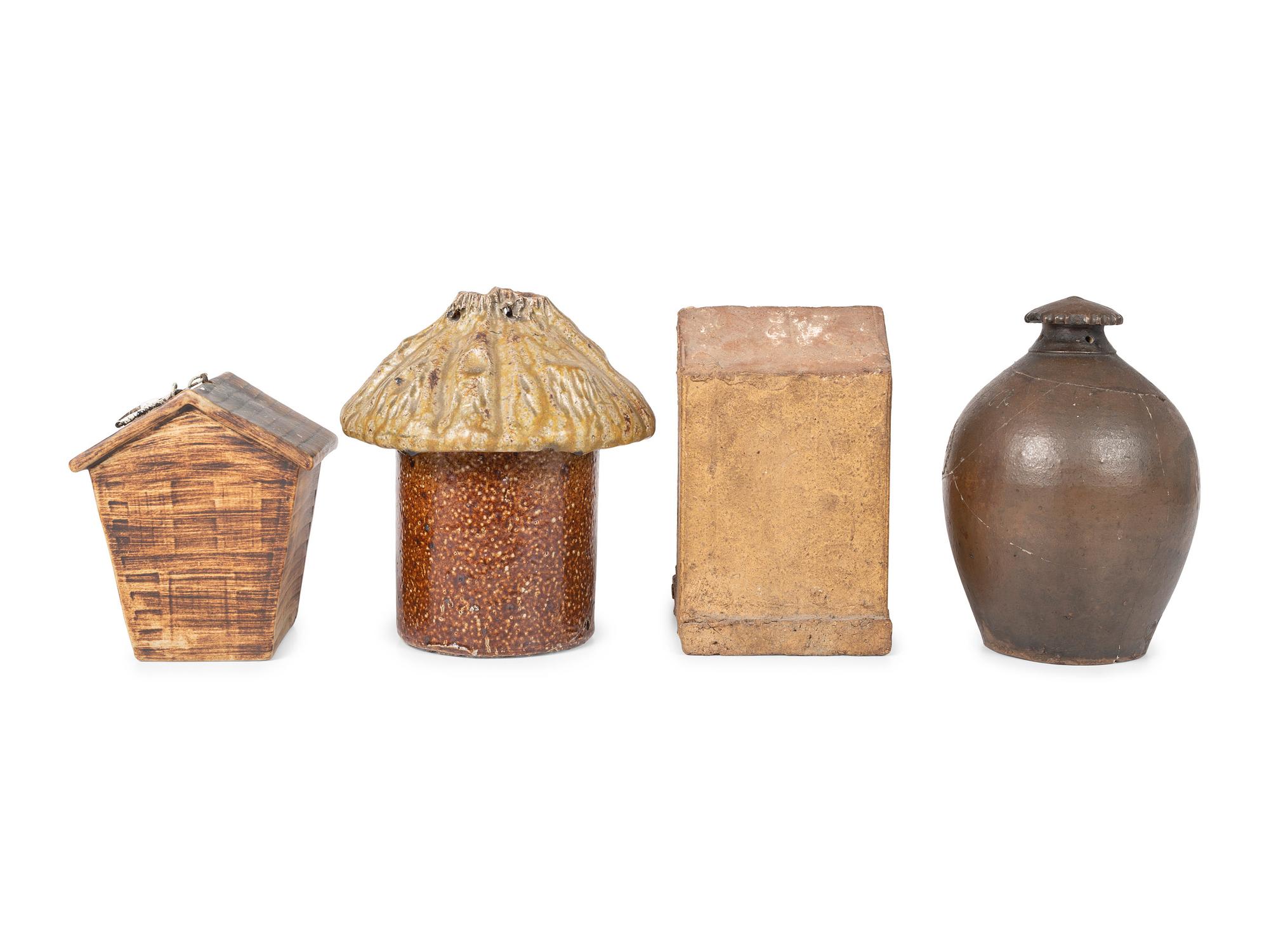 Four Stoneware Birdhouses