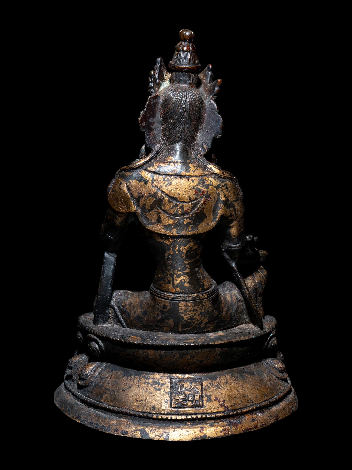 A Sino-Tibetan Parcel Gilt Bronze Figure of a Bodhisattva