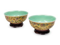A Pair of Chinese Export Famille Jaune Porcelain Bowls with Wood Bases