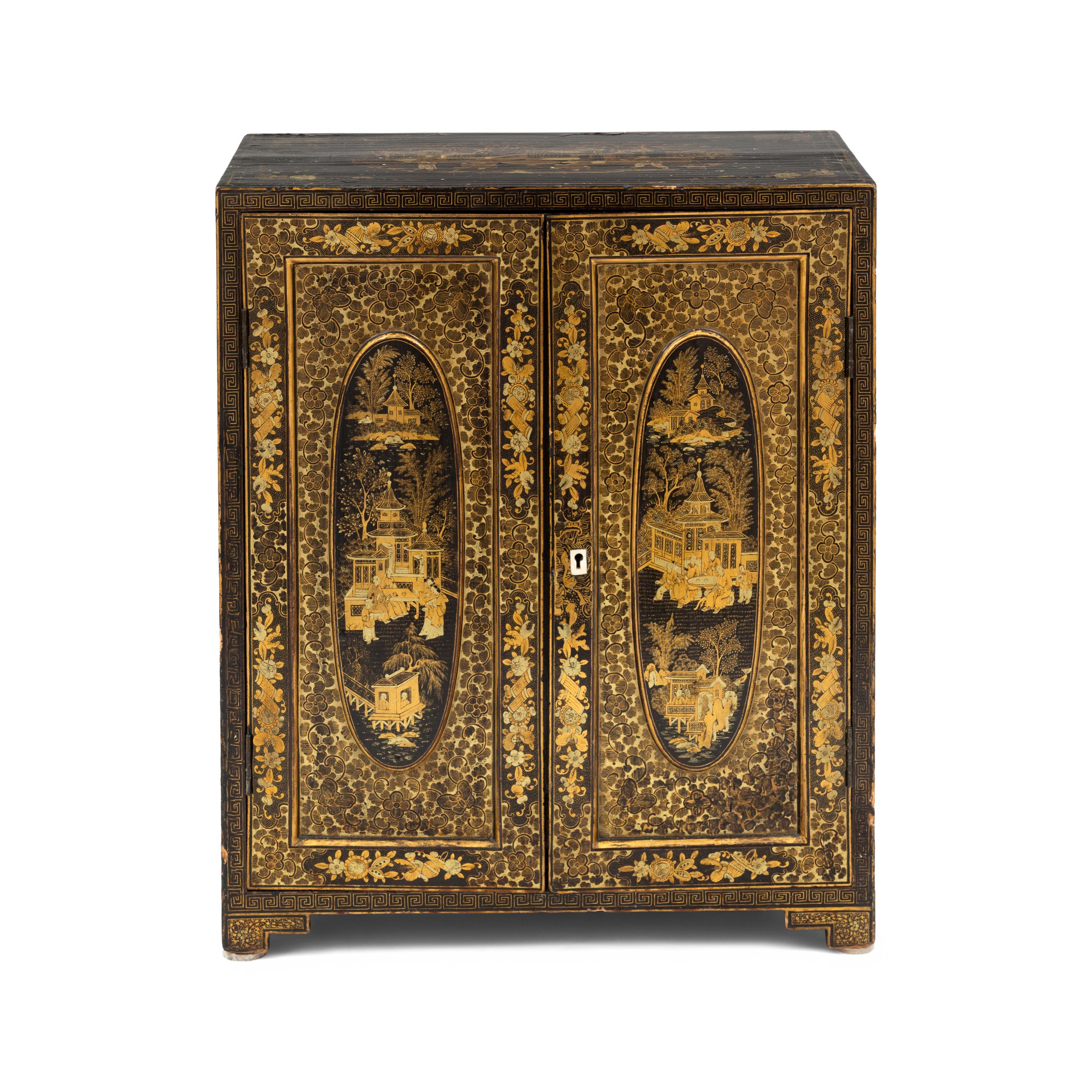 A Chinese Export Black and Gilt Lacquer Collector's Cabinet