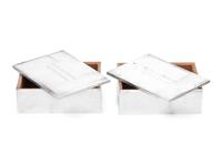 A Pair of American Silver Cigarette Boxes