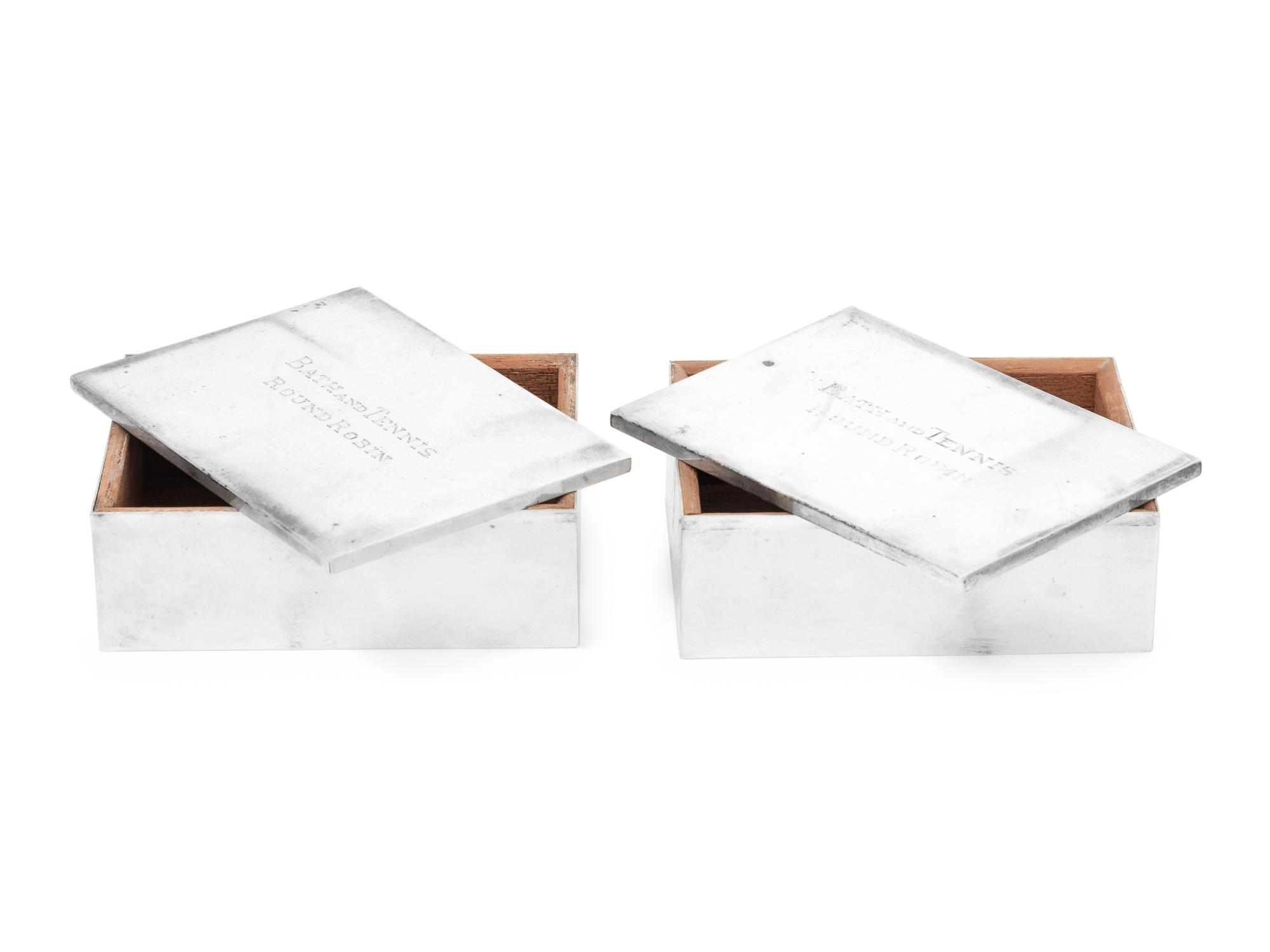 A Pair of American Silver Cigarette Boxes