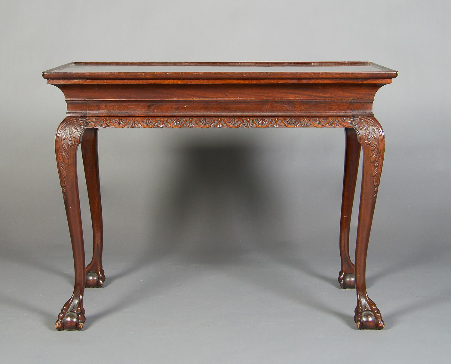 A George II Style Mahogany Center Table, Height 30 x width 40 x depth 27 inches.