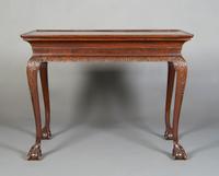 A George II Style Mahogany Center Table, Height 30 x width 40 x depth 27 inches.
