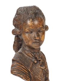 A French Carved Fruitwood Bust of a Young Louis XVI
