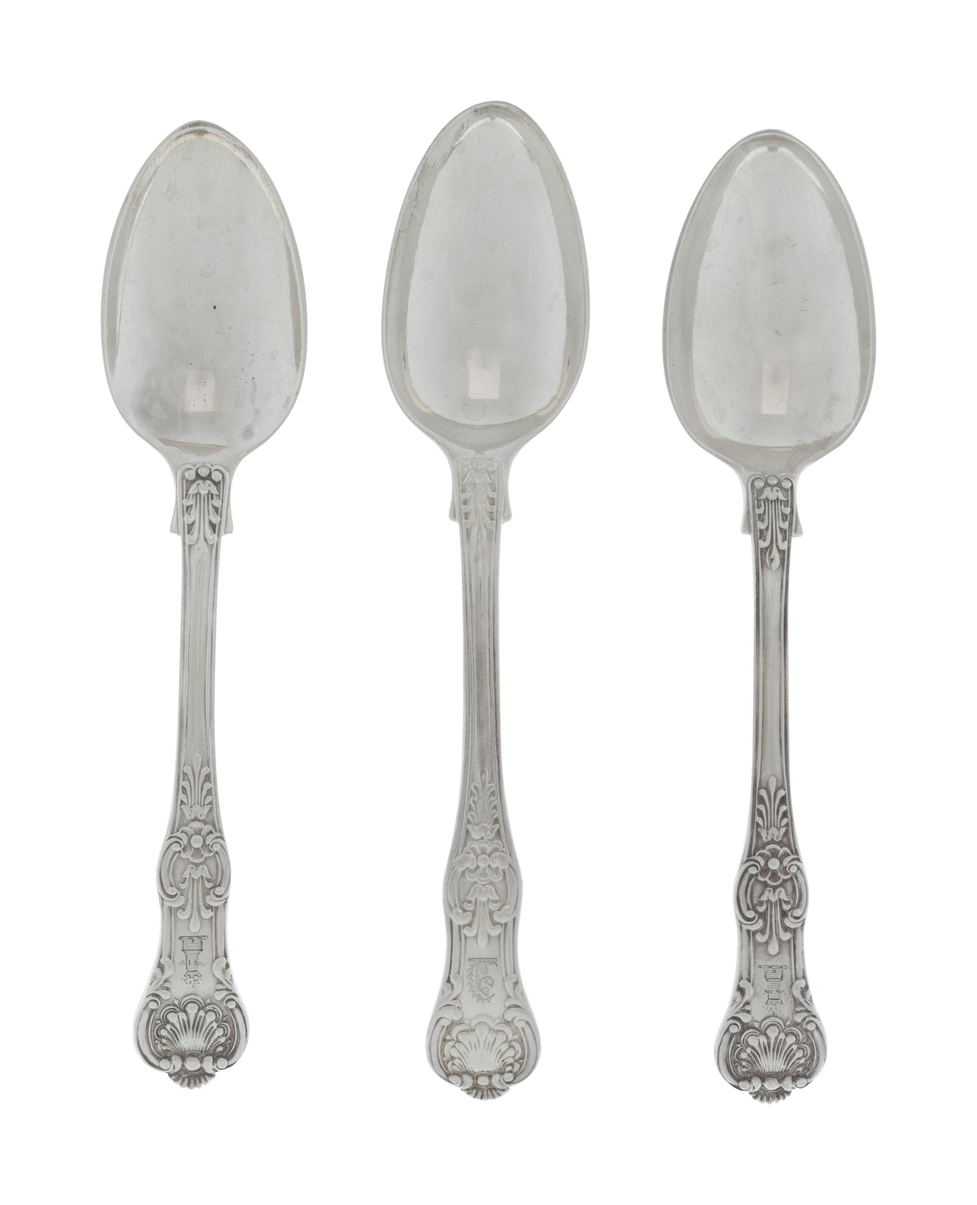 A Group of Twelve English Silver Soup Spoons