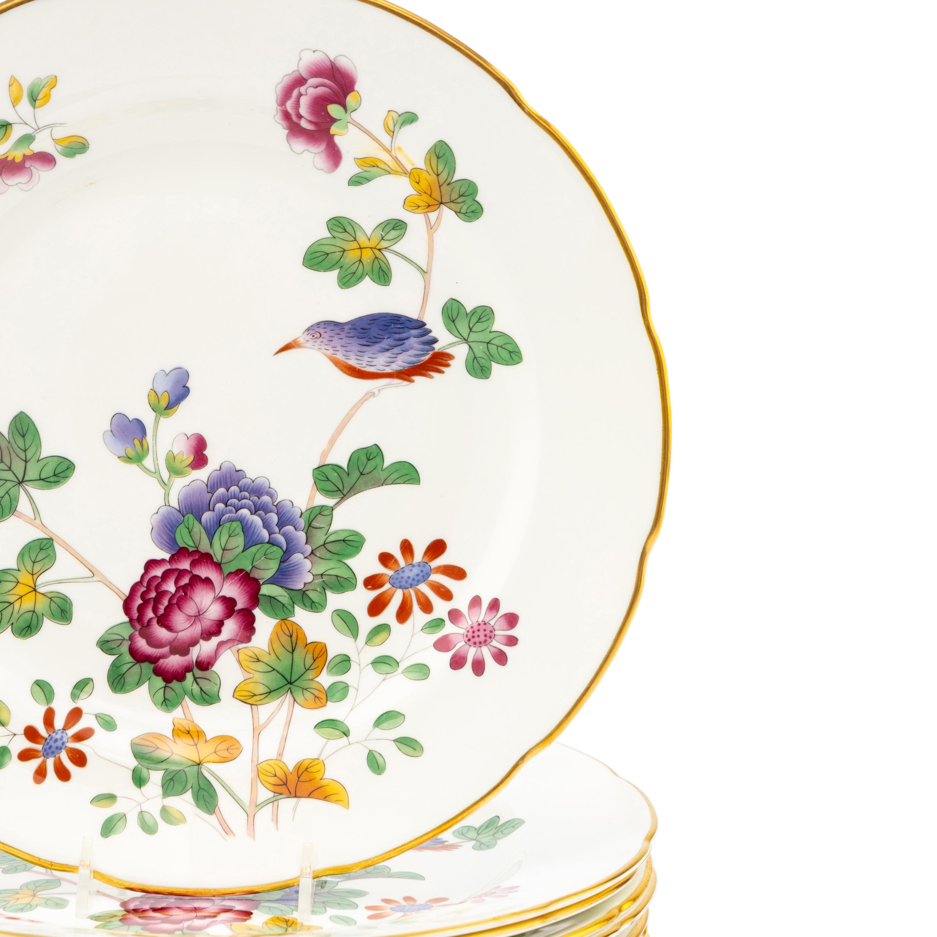 A Set of Twelve Wedgwood Cuckoo Porcelain Dinner Plates