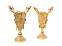 A Pair of French Gilt Bronze Urns, Height 12 1/4 inches.
