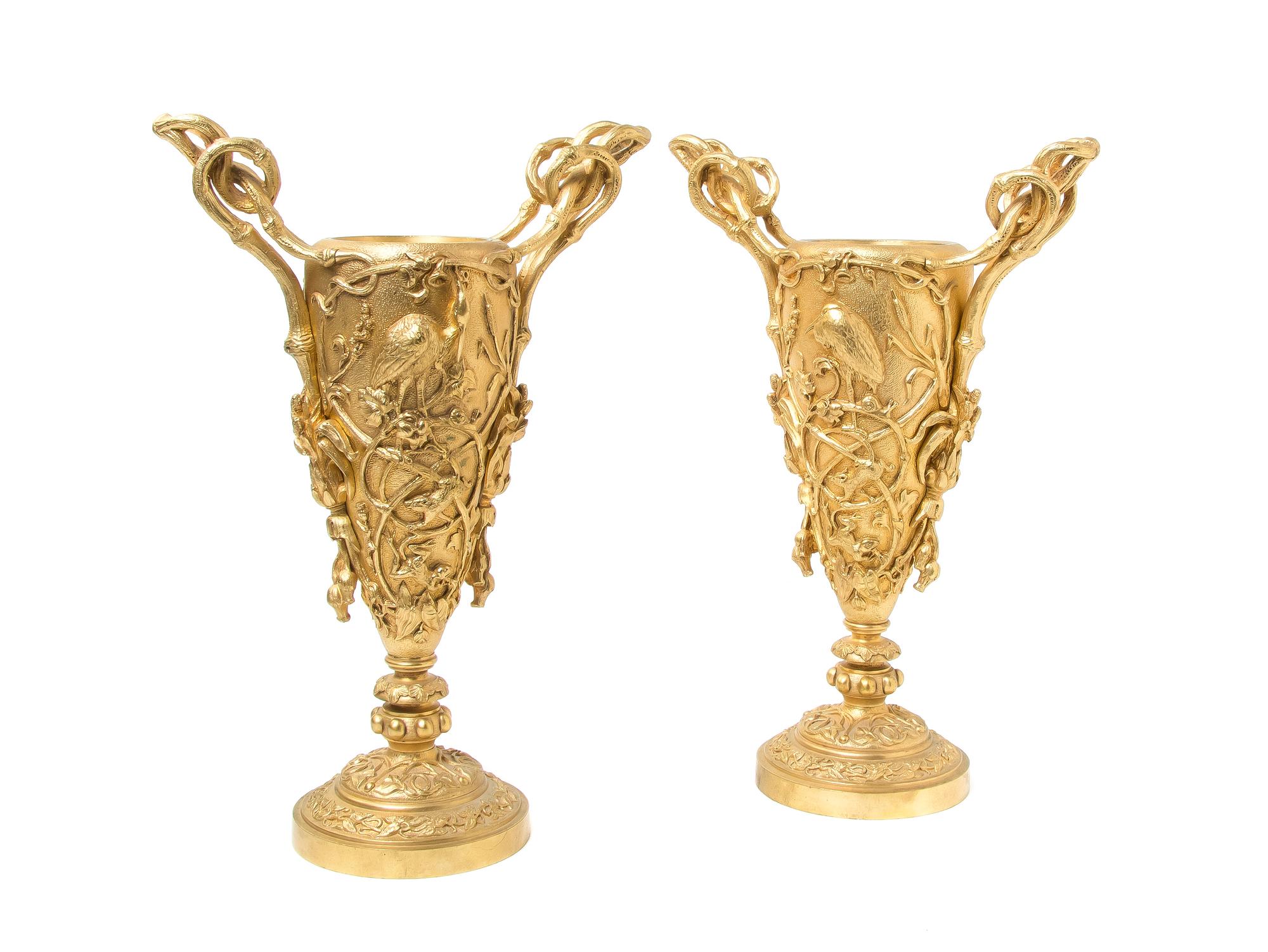 A Pair of French Gilt Bronze Urns, Height 12 1/4 inches.