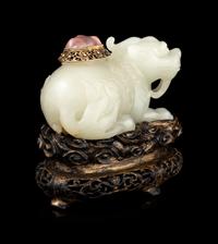 A Carved White Jade Mythical Beast-Form Water Coupe