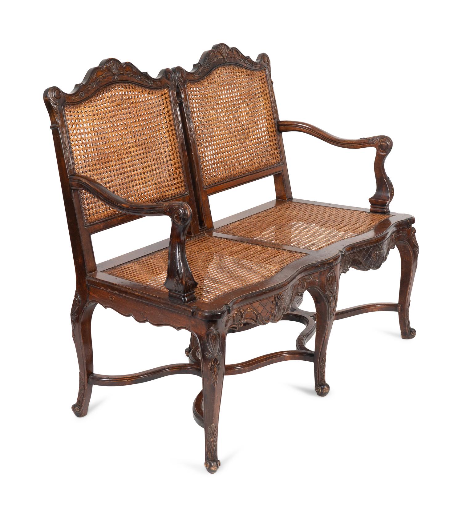 A Louis XV Style Caned Settee — 20TH CENTURY