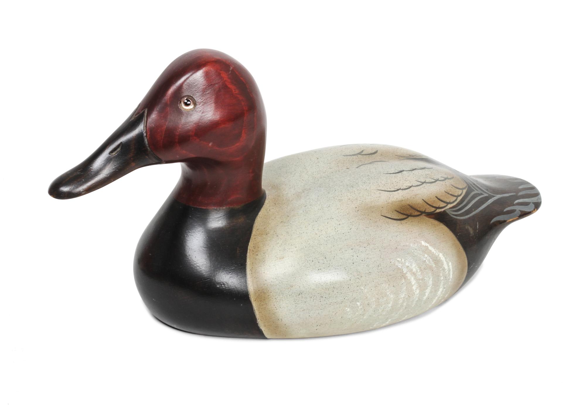 Three Painted Wood Duck Decoys Height 8 1/4 x length 15 x width 7 1/4 inches (largest)