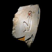 An Egyptian Painted Limestone Relief Fragment