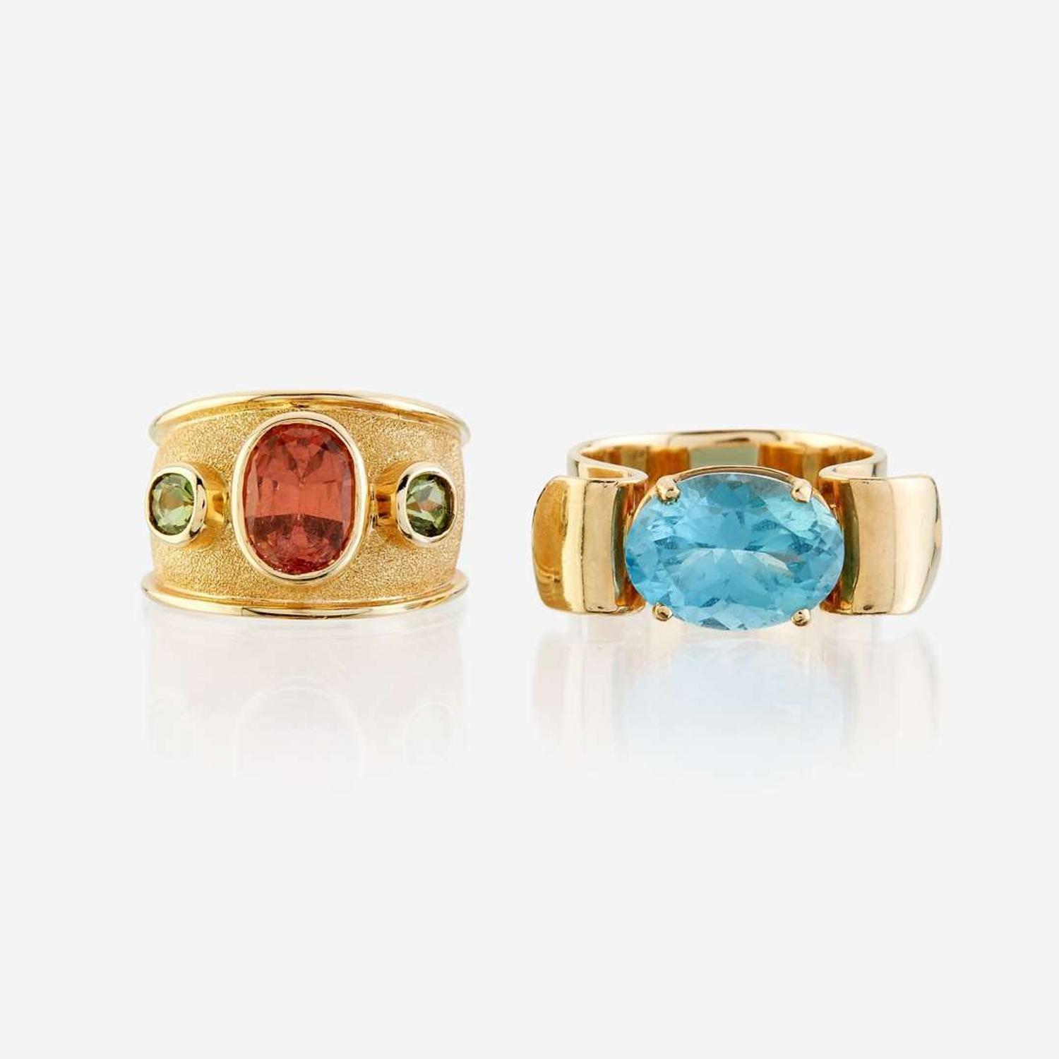 Two fourteen karat gold and gem-set rings