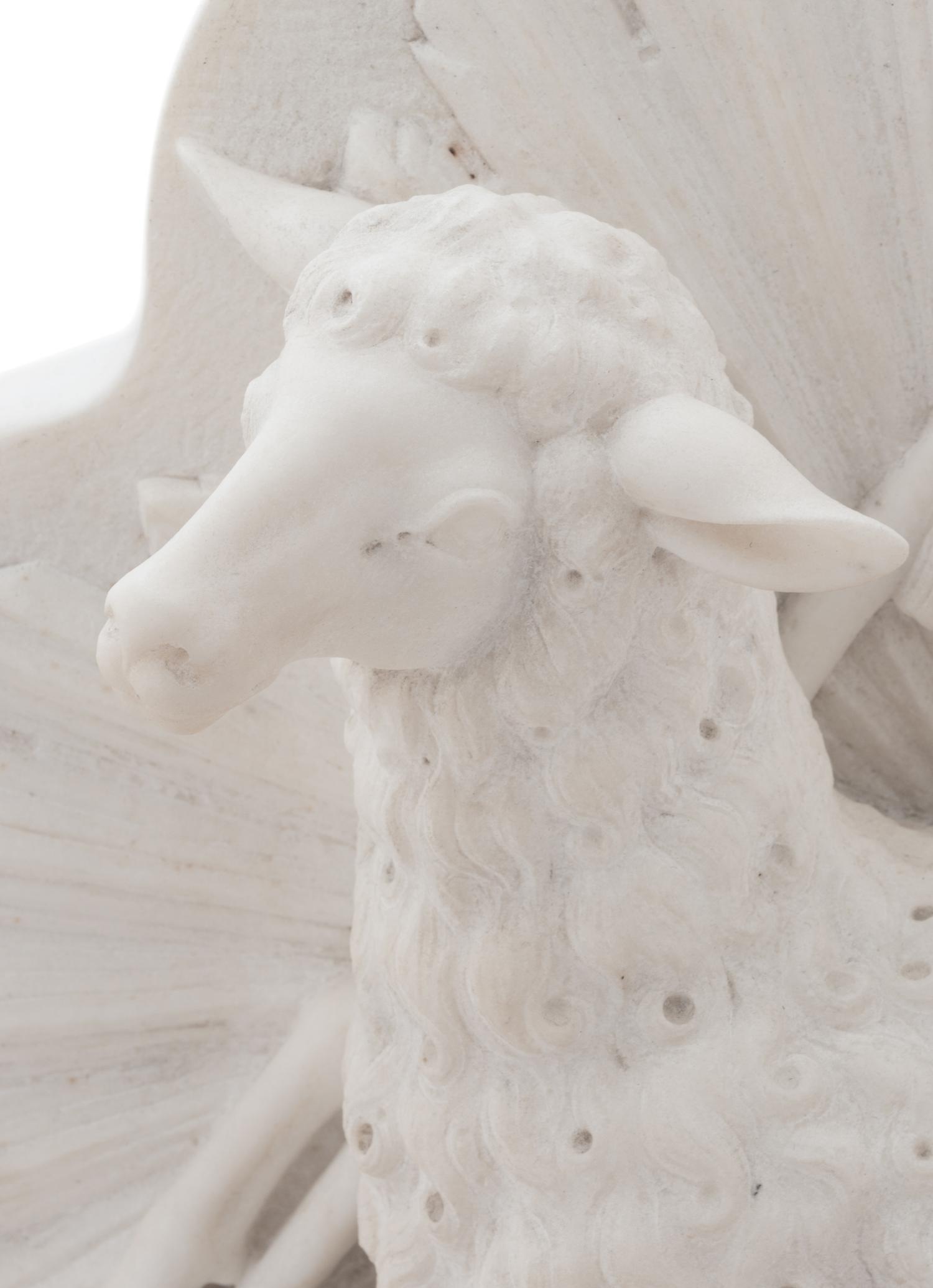 A Carved Marble Figural Group Allegorical of the Lamb of God