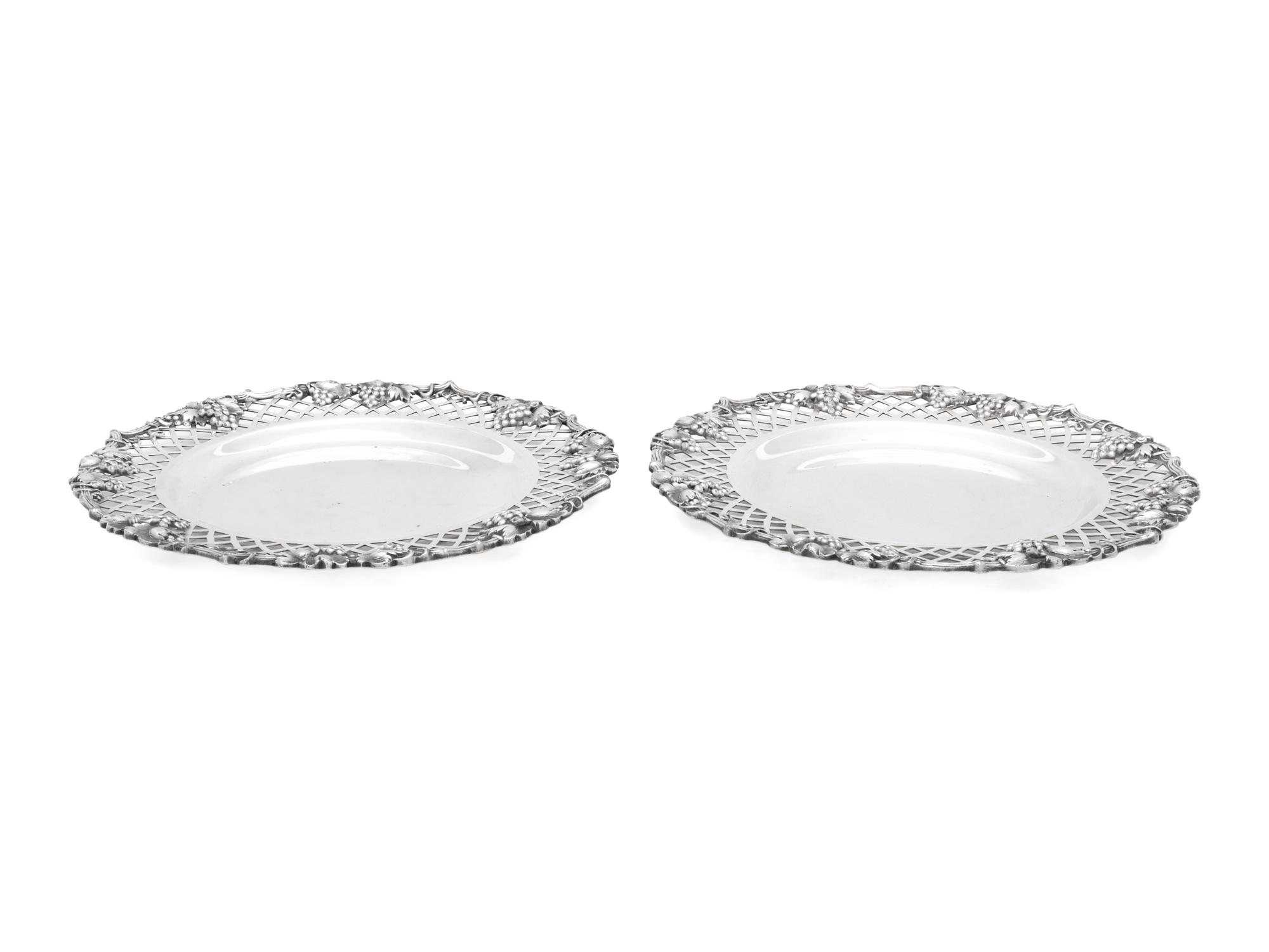 A Pair of Continental Silver-Plate Wine Coasters