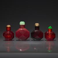 Four Chinese Facetted Ruby Glass Snuff Bottles, 18th Century or Later — 清中期及以後 寶石紅料八方磨棱鼻煙壺四支