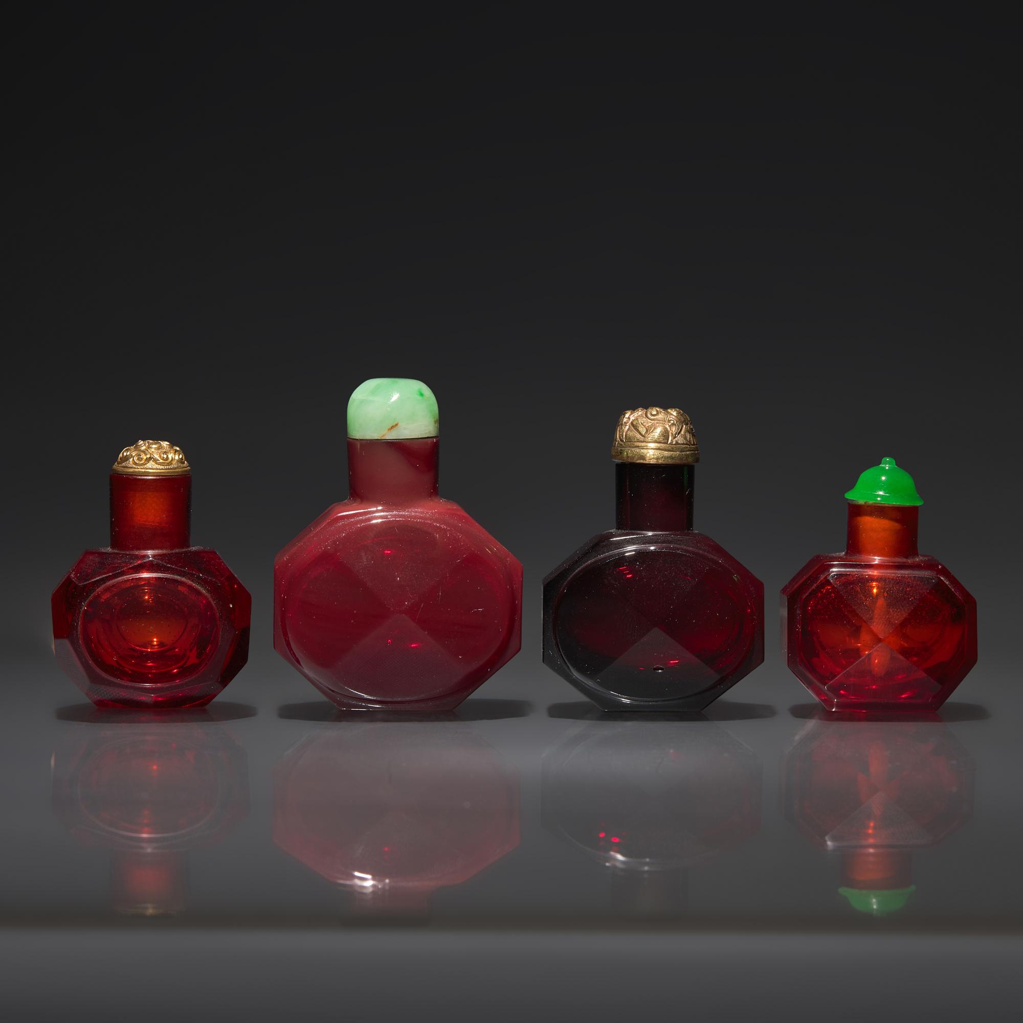 Four Chinese Facetted Ruby Glass Snuff Bottles, 18th Century or Later — 清中期及以後 寶石紅料八方磨棱鼻煙壺四支