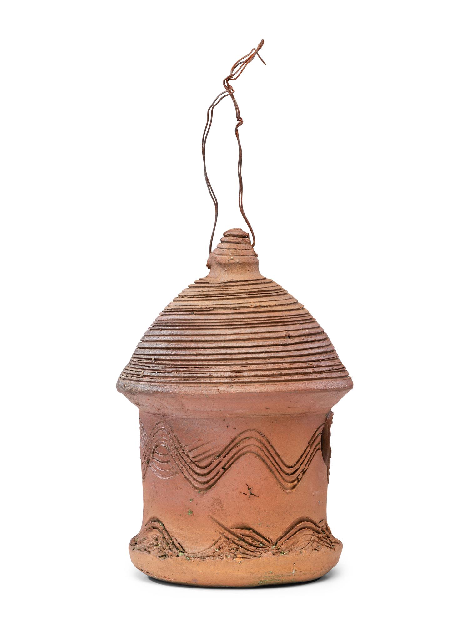 An Incised Sewer Tile Birdhouse
