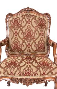 A Pair of Rococo Style Carved Walnut Armchairs