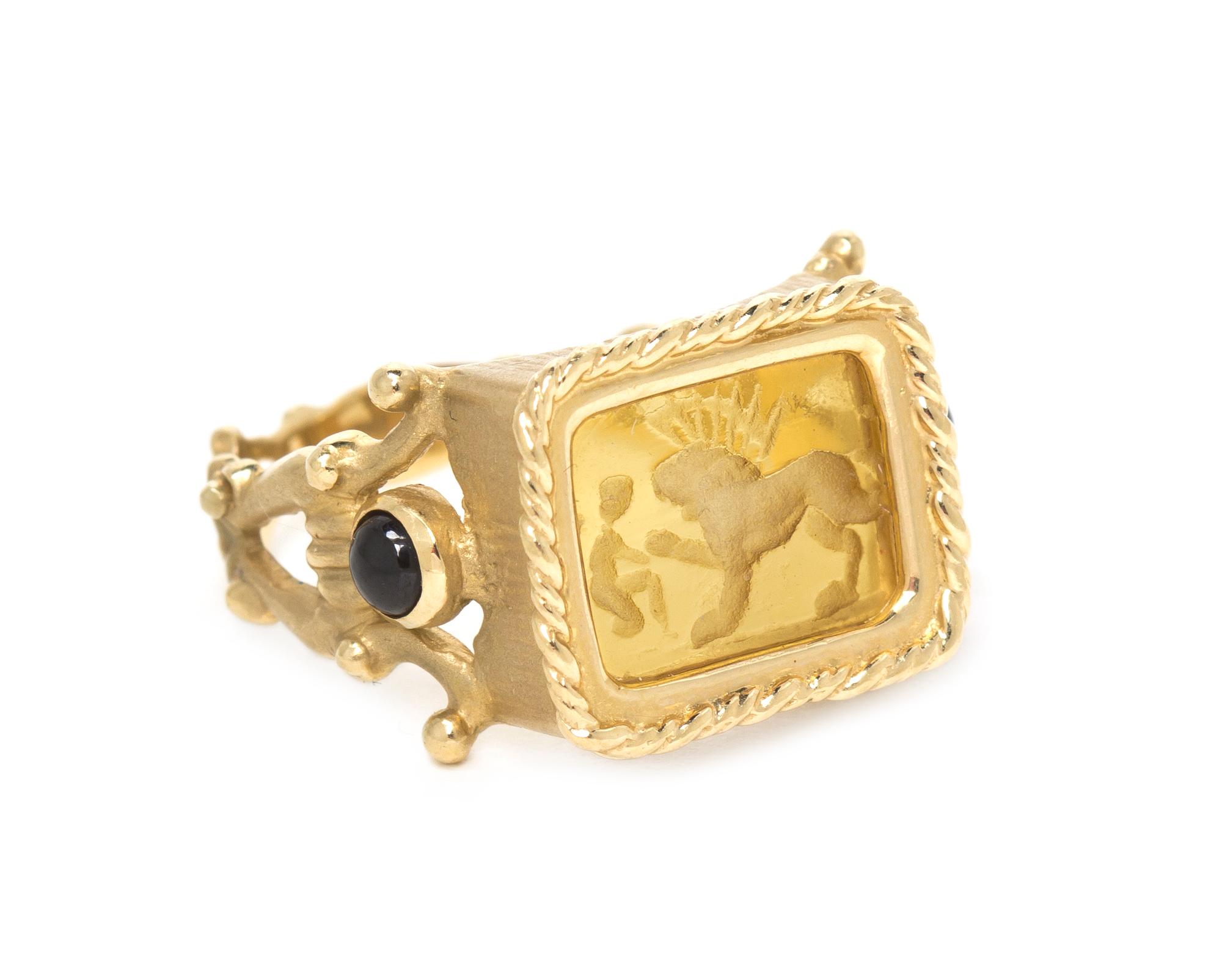 A 14 Karat Yellow Gold, Glass Intaglio and Sapphire Ring, 3.10 dwts.