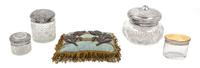 A Collection of Four American Silver-Mounted Glass Dresser Jars, 19TH/20TH CENTURY, each of various forms and sizes, comprising two Ame