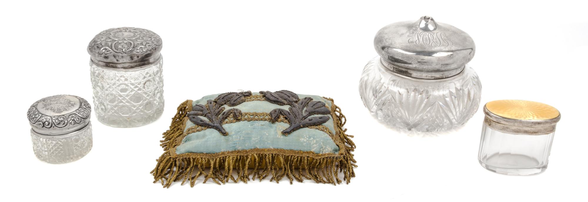 A Collection of Four American Silver-Mounted Glass Dresser Jars, 19TH/20TH CENTURY, each of various forms and sizes, comprising two Ame