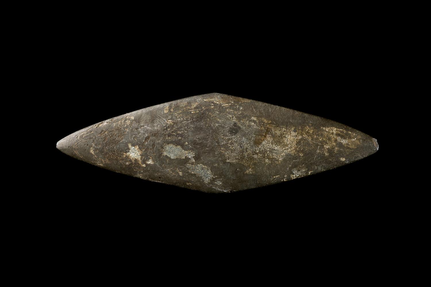 An Egyptian Schist Lozenge-Shaped Palette