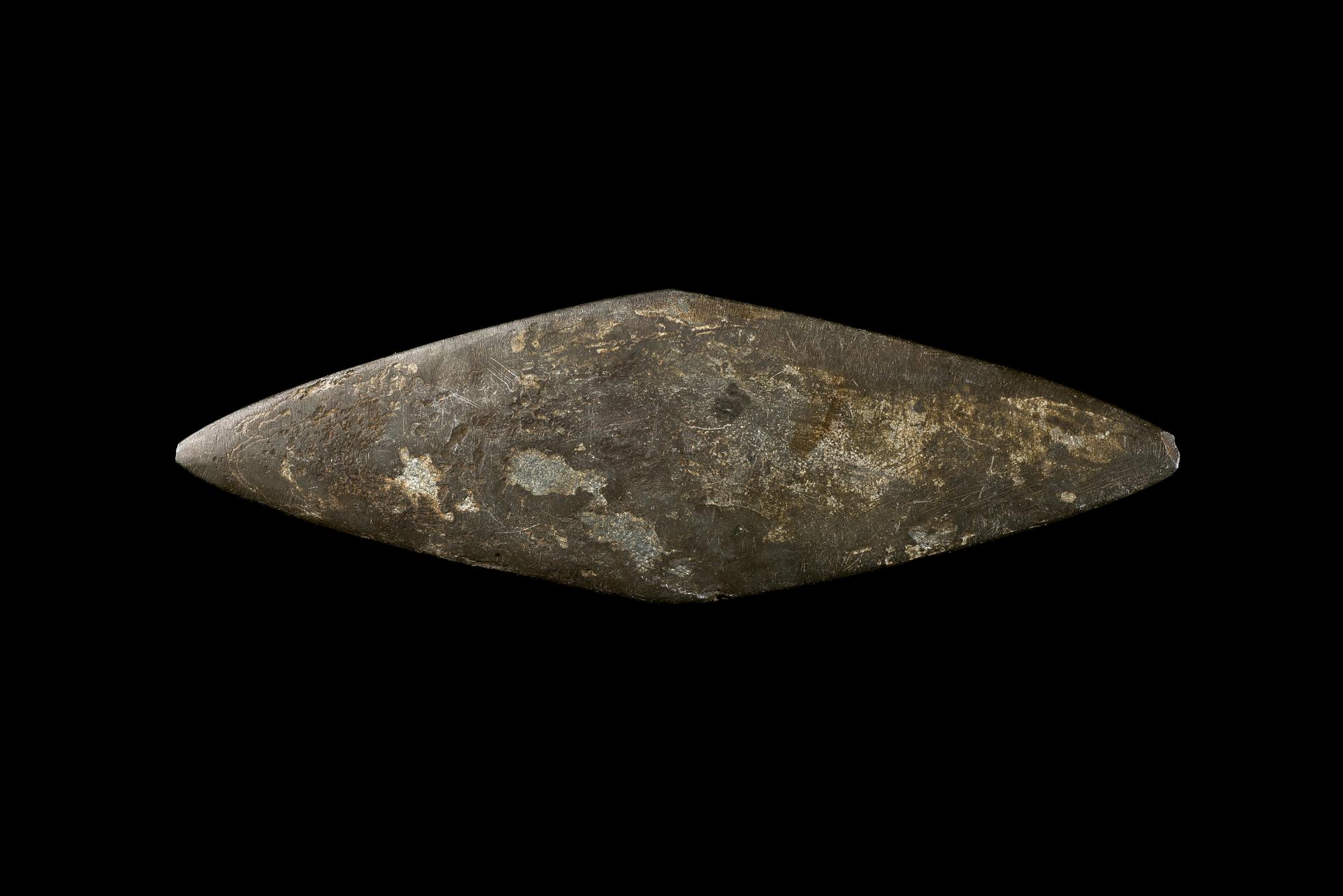 An Egyptian Schist Lozenge-Shaped Palette