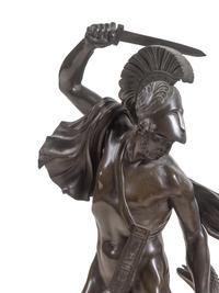An Empire Bronze Mounted Sienna Marble Figural Mantel Clock